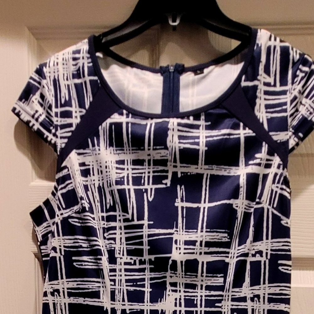 Navy and white cocktail length dress (polyester)